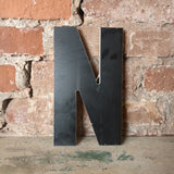 NNN Kunststoff Buchstabe  /