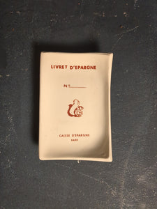 Aschenbecher in Form eines Buches   /